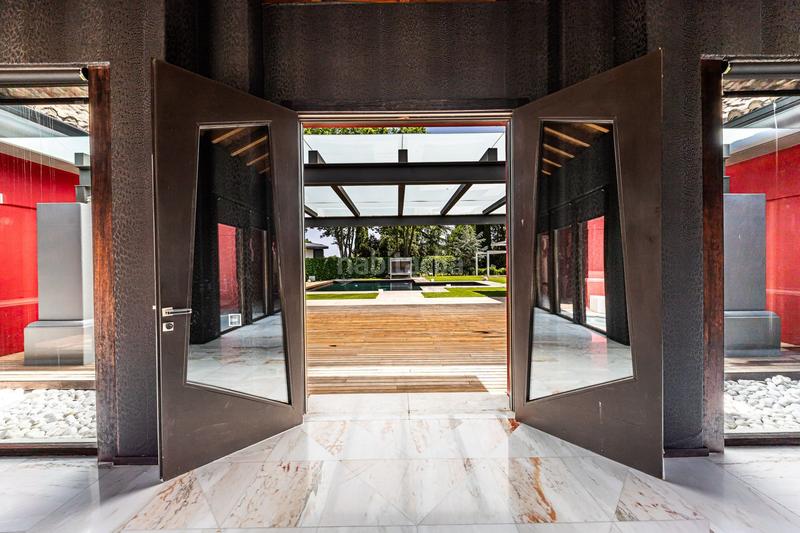 Foto 647e25e5-9f23-4c4f-a650-222629fc9cc8. Casa amb calefacció piscina a urbanización La Moraleja La Moraleja