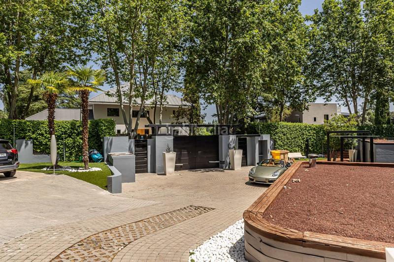 Foto 7df135dc-20f1-465e-90bc-19a8fd8694e3. Casa amb calefacció piscina a urbanización La Moraleja La Moraleja