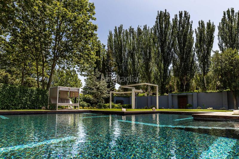 Foto c0a381ca-8613-4525-aa62-68ca7d43176c. Casa amb calefacció piscina a urbanización La Moraleja La Moraleja