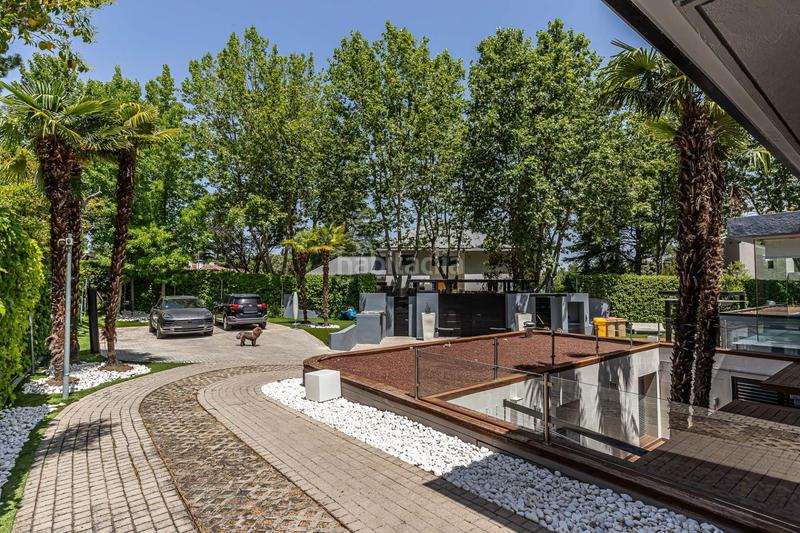 Foto c633106a-82da-49f3-8990-9dfbc09c6bac. Casa amb calefacció piscina a urbanización La Moraleja La Moraleja