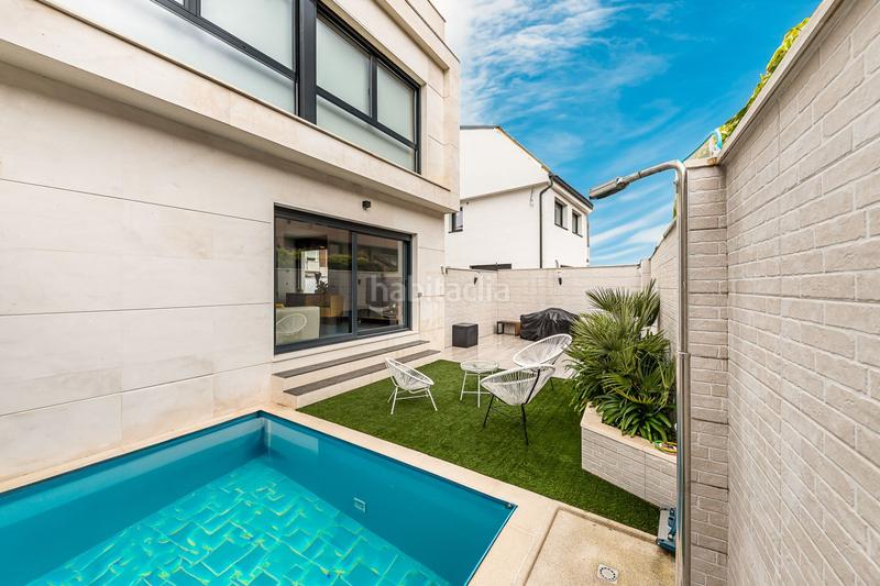 Foto 207262fe-c97b-4c29-84e9-60cf95d3c217. Casa amb calefacció piscina a Montecarmelo Madrid