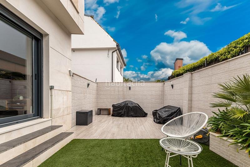 Foto 5b35b010-bfbf-4a6e-9ba1-b012d497404f. Casa amb calefacció piscina a Montecarmelo Madrid