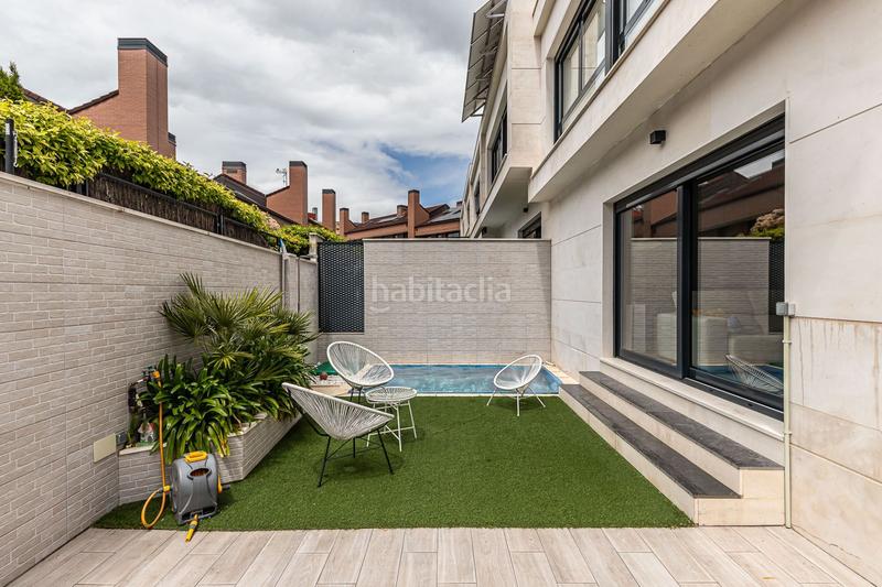 Foto 887e298c-014b-40f9-8d71-f2f10732be5b. Casa amb calefacció piscina a Montecarmelo Madrid