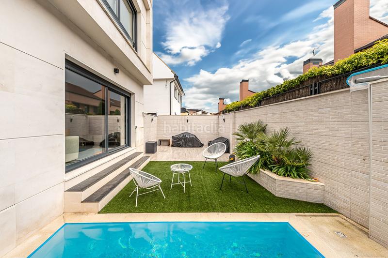 Foto d06e1130-e720-47a1-8bae-bff2c9aa0ee7. Casa amb calefacció piscina a Montecarmelo Madrid