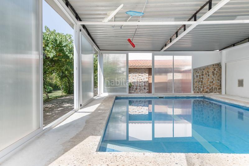 Foto 168db19f-a642-4d7e-879e-40156cc1fbbf. Haus mit heizung pool in Fuente el Saz de Jarama