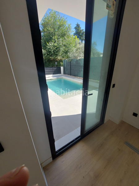 Foto 8d3ea3f0-254d-46f6-b266-e5342159bd25. Casa amb piscina a Estación Pozuelo de Alarcón