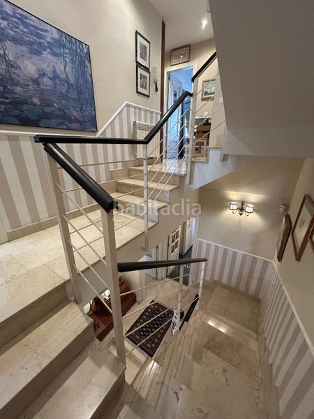 Foto 072440bf-a59b-4f7a-9415-f9cf320848f8. Casa chalet adosado en venta campo de las naciones en Madrid