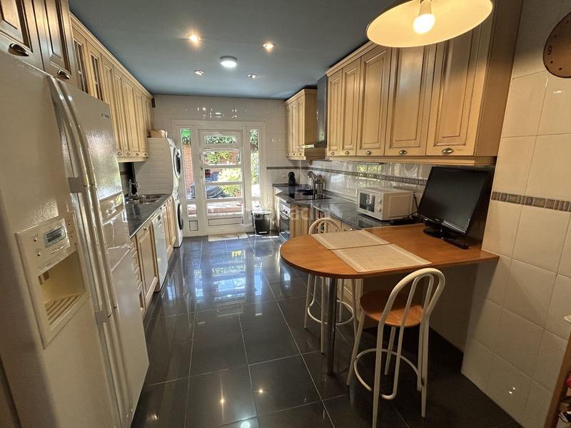 Foto bccb18af-820c-4c2d-85c1-87c8f9866ac2. Casa chalet adosado en venta campo de las naciones en Madrid