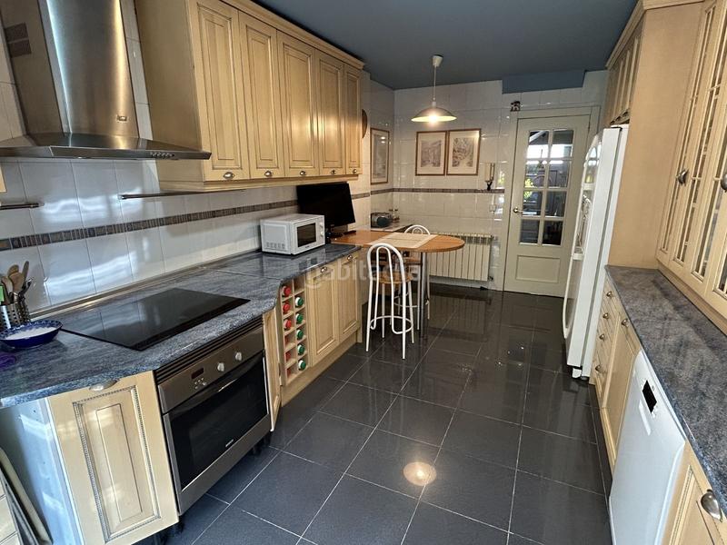 Foto d0e68cb8-638e-4ced-afe3-292eec0b382e. Casa chalet adosado en venta campo de las naciones en Madrid