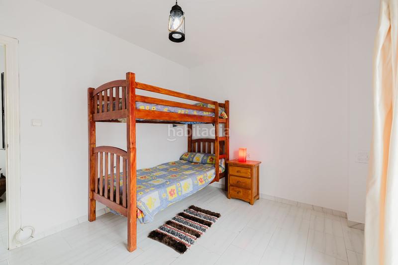 Foto dcd4aa8c-d44f-45e7-b4e7-3fe0c3ef4746. Casa adossada a Urbanización Santa Rosa Torrox