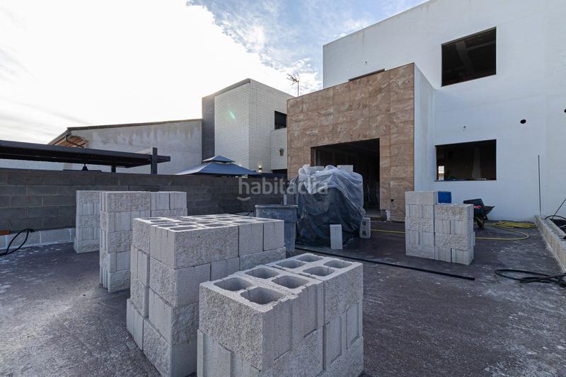 Foto adc73b3f-ff0e-4c96-8149-3364699d253c. Casa a schiera con piscina in Yuncos