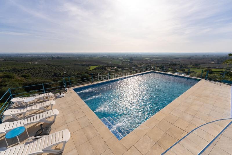 Foto 1ef85592-1e14-4cab-9bea-fc3a33b0ab4e. Casa con riscaldamento piscina in Lora del Río