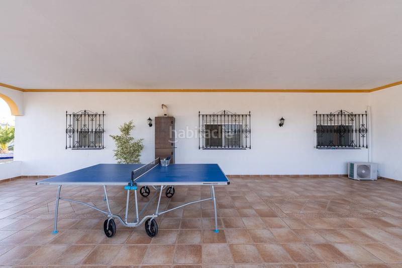 Foto d942a01c-130d-422b-9067-015088864a13. Casa con riscaldamento piscina in Lora del Río