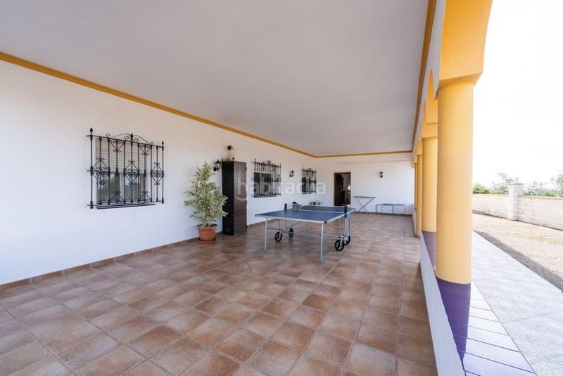 Foto bf0dd512-db69-4032-af4d-1a96ddb1082e. Casa amb calefacció aparcament piscina a Lora del Río