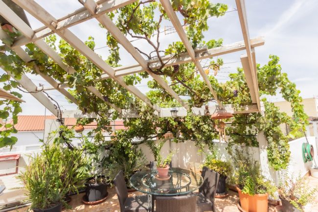 Foto faec7bcf-6aee-4c5e-a442-46de06d6276e. Casa aparellada amb calefacció a Moncada