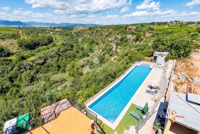 Foto 53b85dd5-3abb-42ec-8801-0de4eda17634. Casa amb calefacció aparcament piscina a Onda