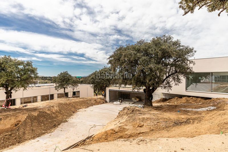 Foto 0693f76e-0cc0-40a5-91ea-90490553c739. Casa amb calefacció aparcament piscina a Urbanización Este-Montepríncipe Boadilla del Monte