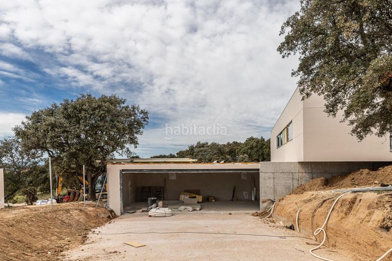 Foto 57a49e2a-a503-4d7c-bfe2-5368a8650a25. Casa amb calefacció aparcament piscina a Urbanización Este-Montepríncipe Boadilla del Monte