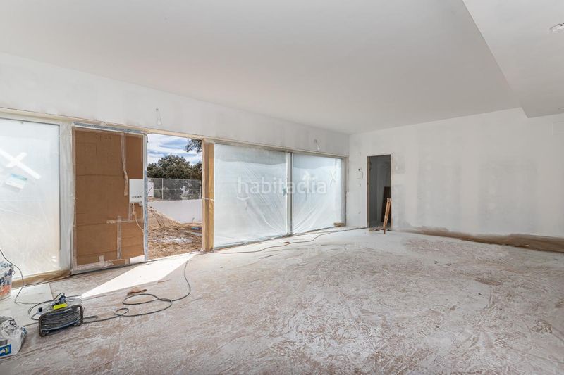 Foto 8007a5d6-fcb7-49ee-b7f2-a6c6b332f54a. Casa amb calefacció aparcament piscina a Urbanización Este-Montepríncipe Boadilla del Monte