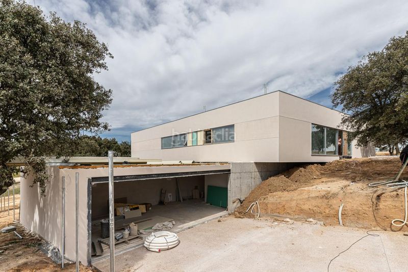 Foto 91d8ae90-3c6e-4aa6-bcfd-37e6a5eb770b. Casa amb calefacció aparcament piscina a Urbanización Este-Montepríncipe Boadilla del Monte