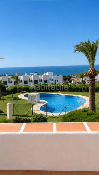 Foto f55de063-69c4-4890-a6e9-a1c528412115. Casa adossada amb calefacció piscina a Capistrano Nerja