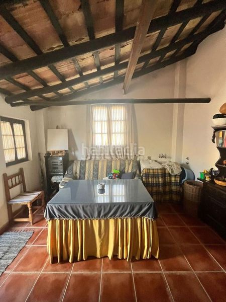 Foto d8f1b3f1-3551-4cf3-8ce9-806b22a4912d. Casa adossada amb calefacció a Écija