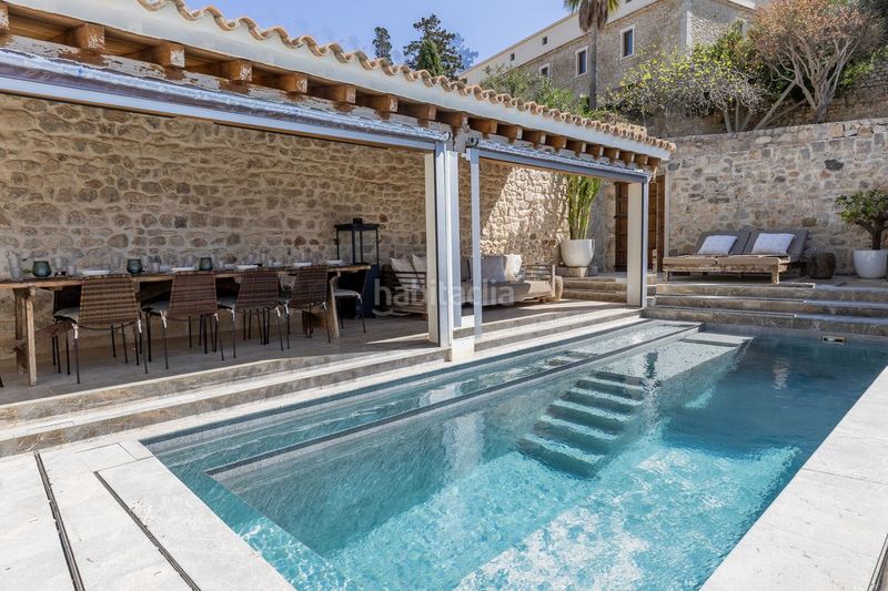 Foto 1b2e6669-d82e-46ff-a6dd-9f97f8ee6ba0. Casa adossada amb calefacció aparcament a Dalt Vila-La Marina Ibiza