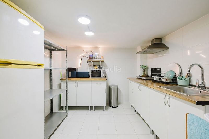 Foto bf367ec8-f46d-45d1-b49a-61013a65fa53. Casa adossada amb calefacció aparcament a Centro Mijas