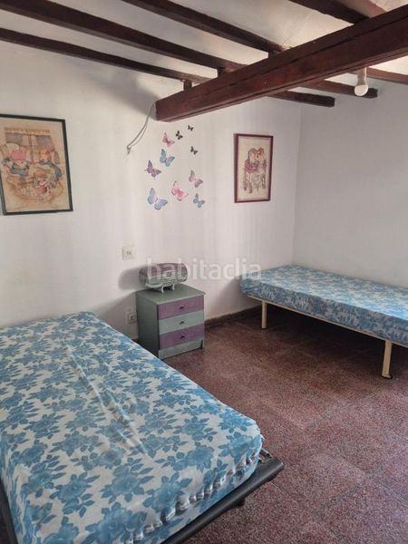 Foto 3b20e8d0-4e5d-4019-9fd3-cecf4bd99ed2. Casa adossada amb calefacció a Monòver