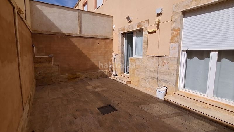 Foto aee51561-a710-43c8-bf17-9b0c31f396e7. Casa adossada amb calefacció aparcament a Malagón