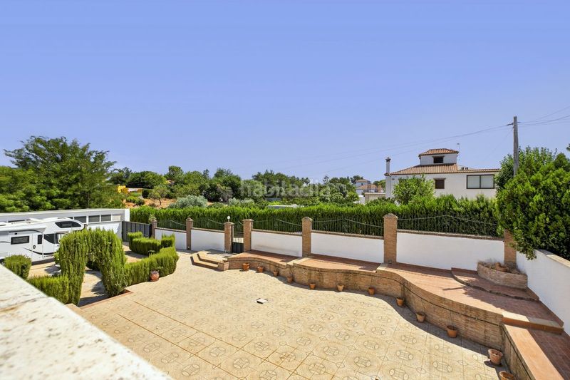Foto 4a8a2b55-b31b-4b24-bd5a-9f23cd053e41. Casa amb calefacció aparcament piscina a Carmona