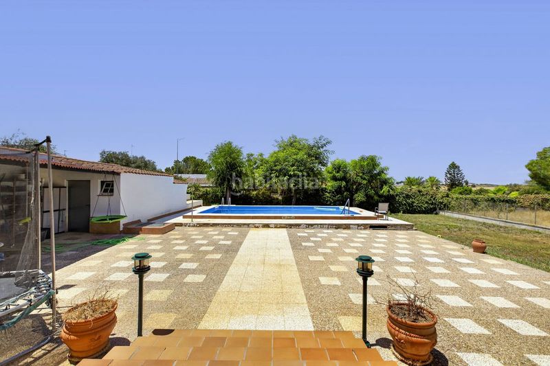 Foto a4c1bffe-a7b4-4f5f-b1d3-80c01c0c64db. Casa amb calefacció aparcament piscina a Carmona