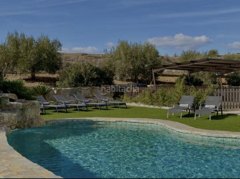 Foto 912a42db-dd1f-40cd-897e-f9191ec2ac88. Casa amb calefacció aparcament piscina a Coín