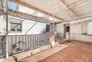 Casa aparellada  C. real