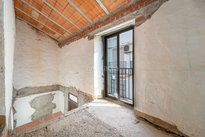 Foto cd78417c-03f6-4753-b328-7655dd7ae049. Casa aparellada amb calefacció a Benamargosa