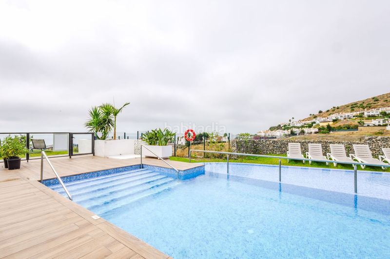 Foto 0e6b4cbc-fa17-4934-9349-38b35b64cd91. Casa adossada amb calefacció aparcament piscina a Mijas