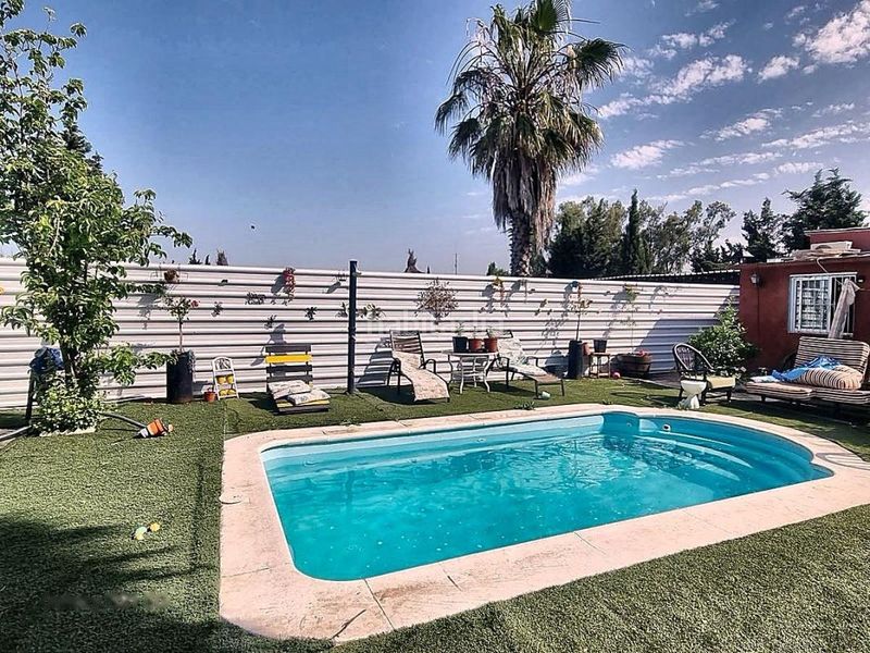 Foto 7019bef9-c7fd-42c0-8367-5acc0c33747f. Casa amb calefacció a La Hacienda - Nueva Andalucía Dos Hermanas