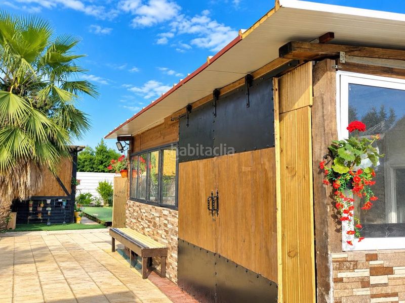Foto b3763b02-385b-4f42-81b0-c77aa02b556e. Casa amb calefacció a La Hacienda - Nueva Andalucía Dos Hermanas