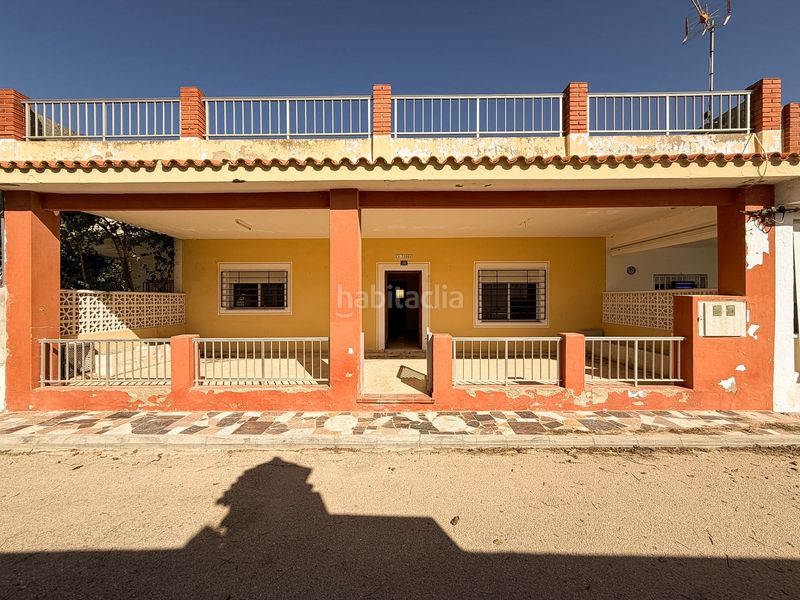 Foto 05730d99-d0c9-46f5-8abf-c41f423f71e7. Casa adossada amb xemeneia a El Marenyet Cullera