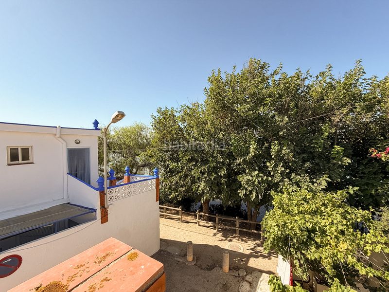 Foto ad31d3e0-05d7-4fb8-8d6b-d053c8e68cef. Casa adossada amb xemeneia a El Marenyet Cullera