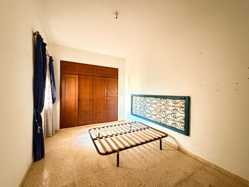 Foto aef4a221-99f7-4af8-b60b-2a502a63c1d0. Casa adossada amb xemeneia a El Marenyet Cullera