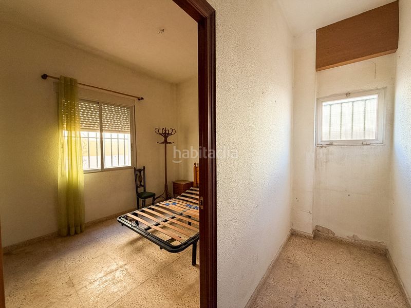 Foto c5ed1d1d-7a02-49f6-82a4-57909b694e56. Casa adossada amb xemeneia a El Marenyet Cullera