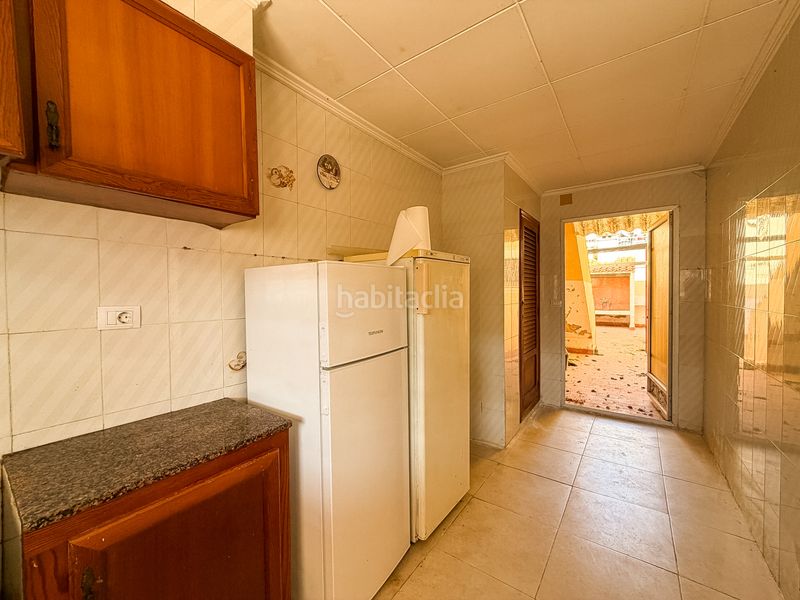 Foto eb011294-ea6a-4c11-8120-e9c4d4970e83. Casa adossada amb xemeneia a El Marenyet Cullera