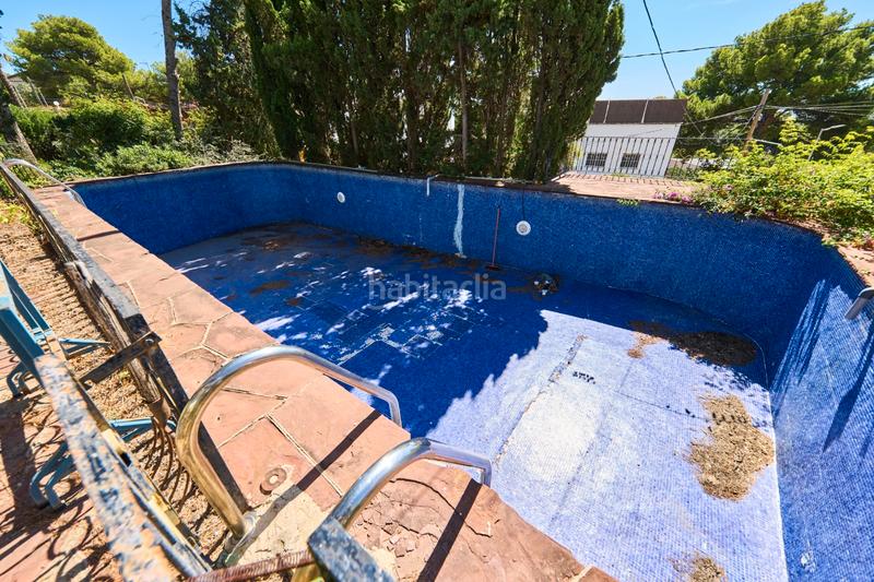 Foto 16f12e7f-f719-45fe-8bc3-21deac2067c8. Maison avec cheminée parking piscine dans Montmar Castelldefels