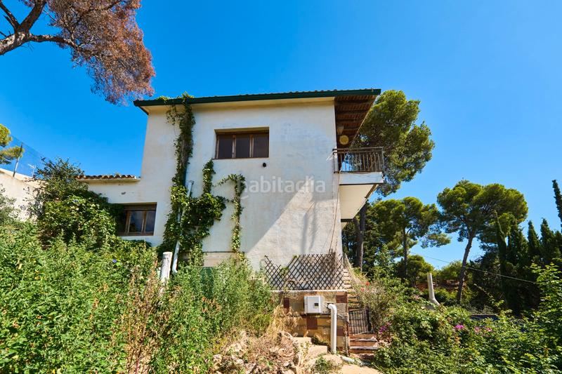 Foto c8595263-b20f-477e-b8fc-baee97b8ca23. Maison avec cheminée parking piscine dans Montmar Castelldefels