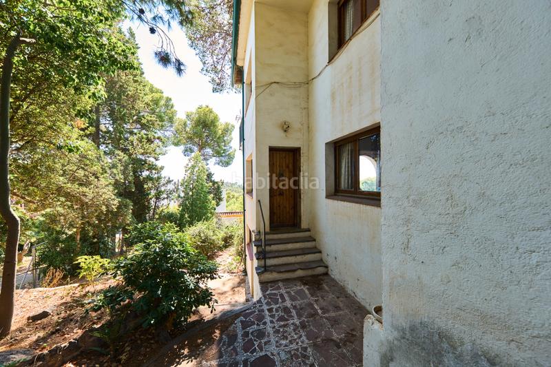 Foto f10cfc14-478b-48e9-8c54-6bbe5c8f7dbc. Maison avec cheminée parking piscine dans Montmar Castelldefels