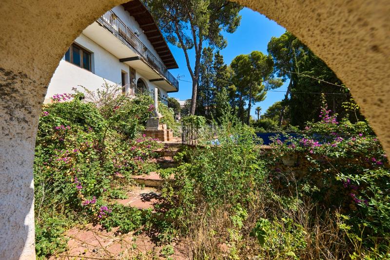 Foto fcb98bc4-a379-4518-9fd3-b5c96e2c0375. Maison avec cheminée parking piscine dans Montmar Castelldefels