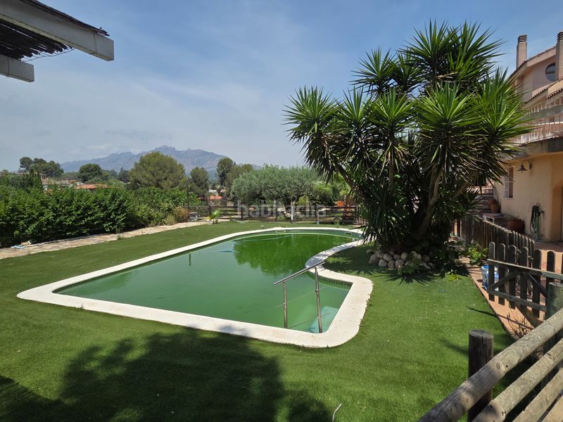 Foto 1833c61b-3262-4857-9ac6-ef19abc79b41. Casa amb aparcament piscina a Can Rial Esparreguera