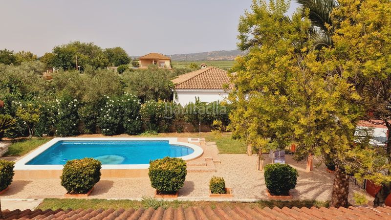 Foto b9a677e7-7bfb-4851-a9e7-98727d6244ad. Casa amb xemeneia calefacció aparcament piscina a Córdoba