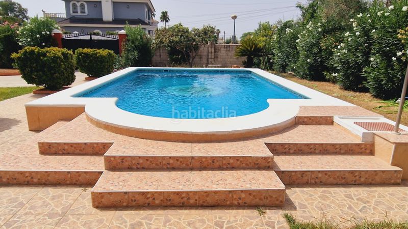 Foto daee57cd-e72e-4110-a8e0-2566866d8945. Casa amb xemeneia calefacció aparcament piscina a Córdoba